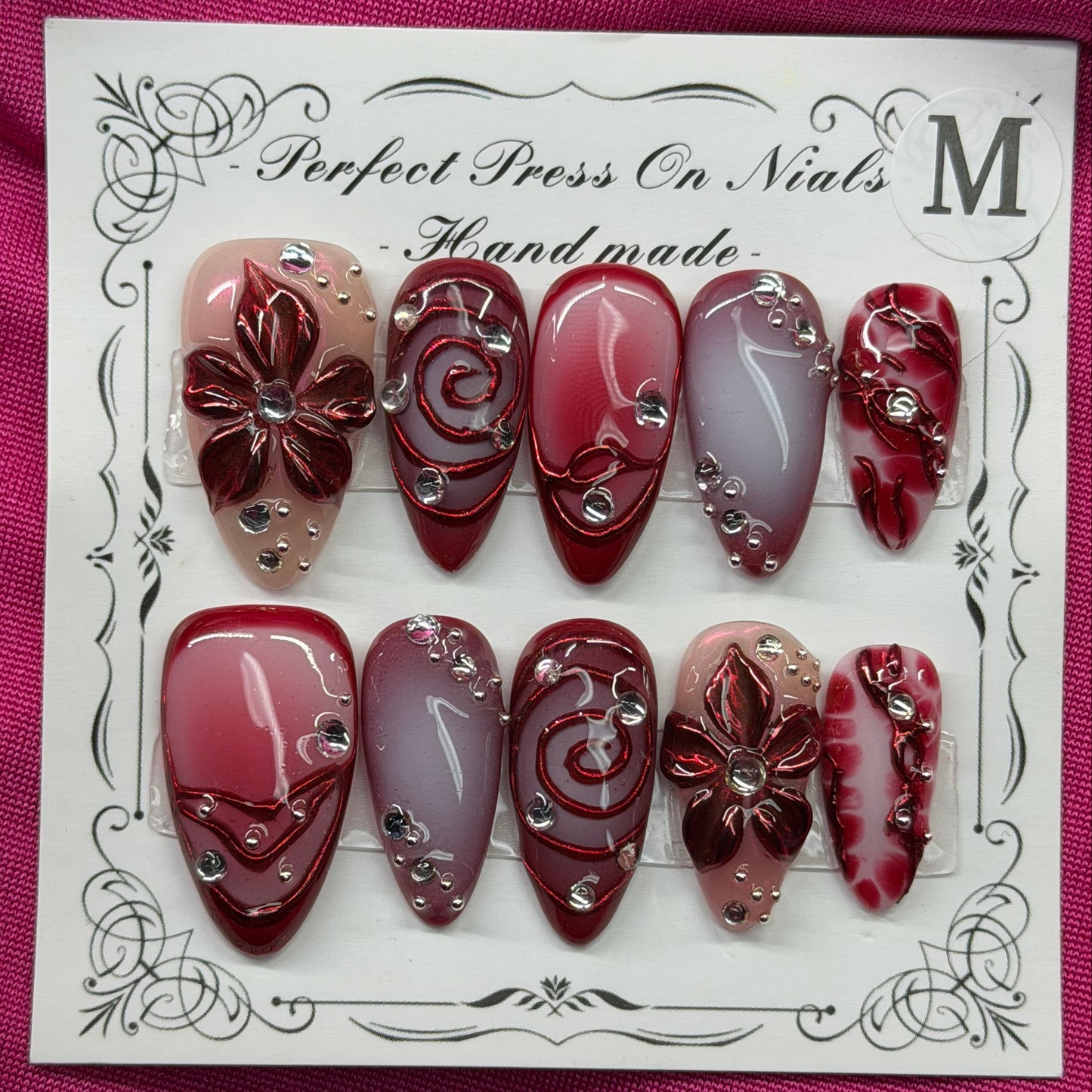 Maroon floral swirl