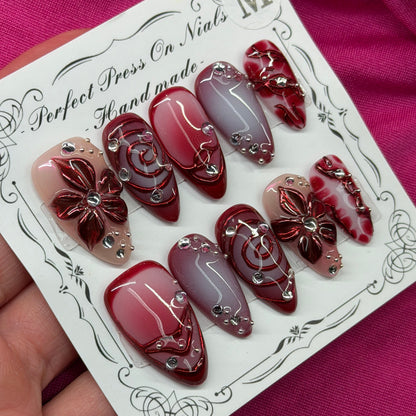 Maroon floral swirl