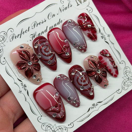 Maroon floral swirl
