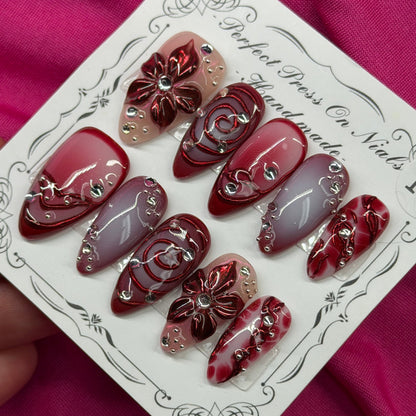 Maroon floral swirl