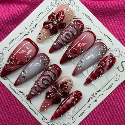 Maroon floral swirl