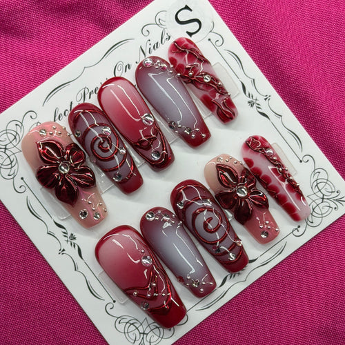 Maroon floral swirl